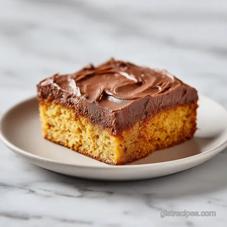 A perfectly cut square of peanut butter bar, topped with glossy chocolate frosting, artfully arranged on a white plate.